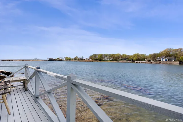 a view of a livingroom with furniture and a dining room