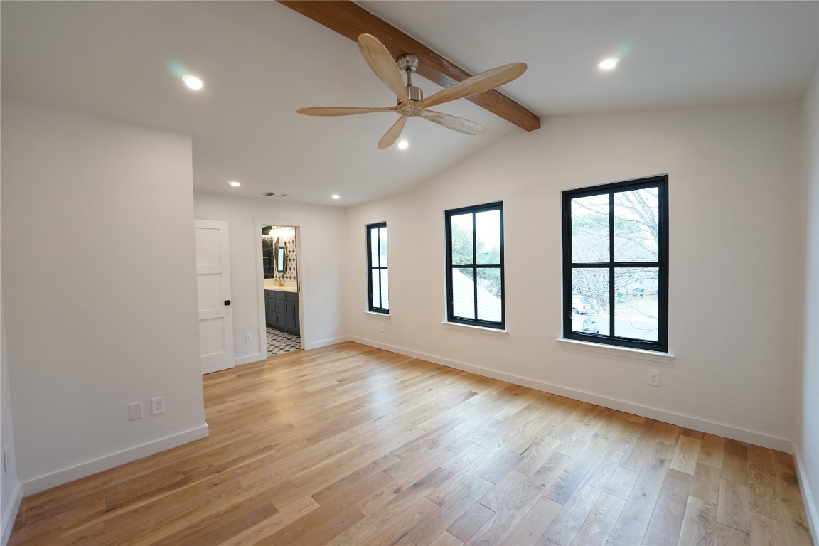 8006 Tiffany Drive Austin, TX 78749 - Photo 11 of 22 an empty room with wooden floor and windows