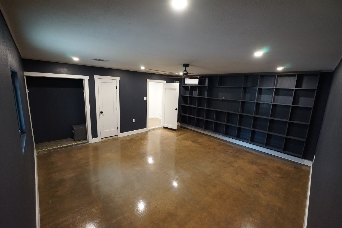 8006 Tiffany Drive Austin, TX 78749 - Photo 17 of 22 a view of an empty room with a cabinet and mirrors