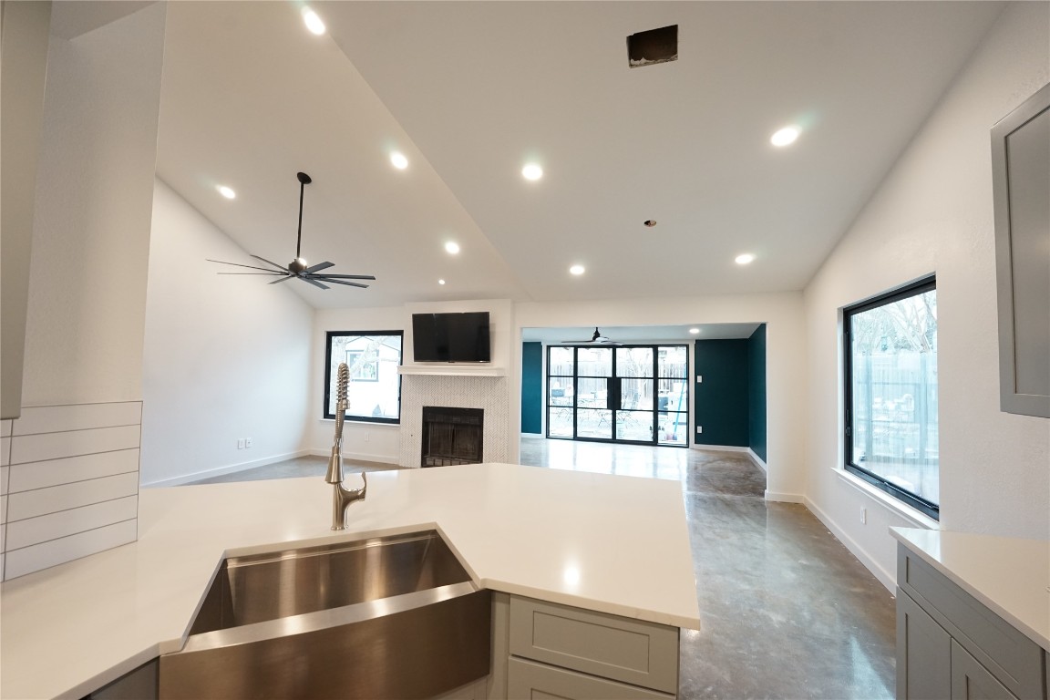 8006 Tiffany Drive Austin, TX 78749 - Photo 22 of 22 a kitchen with stainless steel appliances kitchen island a sink stove and refrigerator