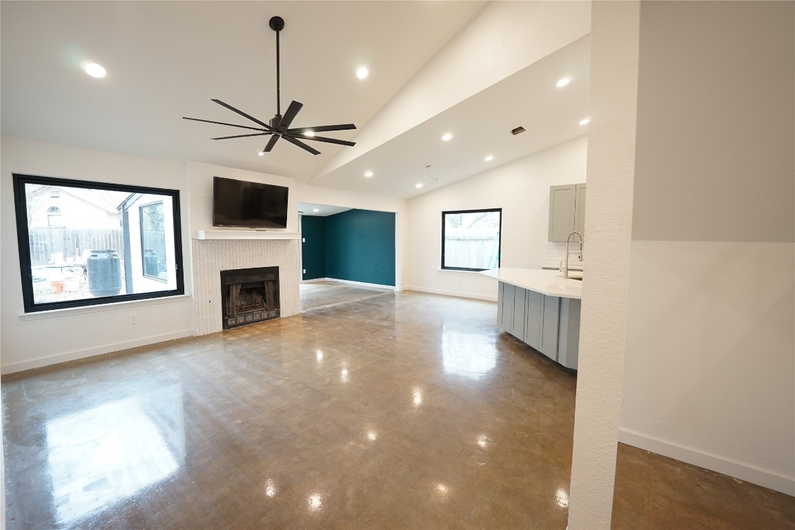 8006 Tiffany Drive Austin, TX 78749 - Photo 3 of 22 a view of a livingroom with a fireplace a sink and a couch