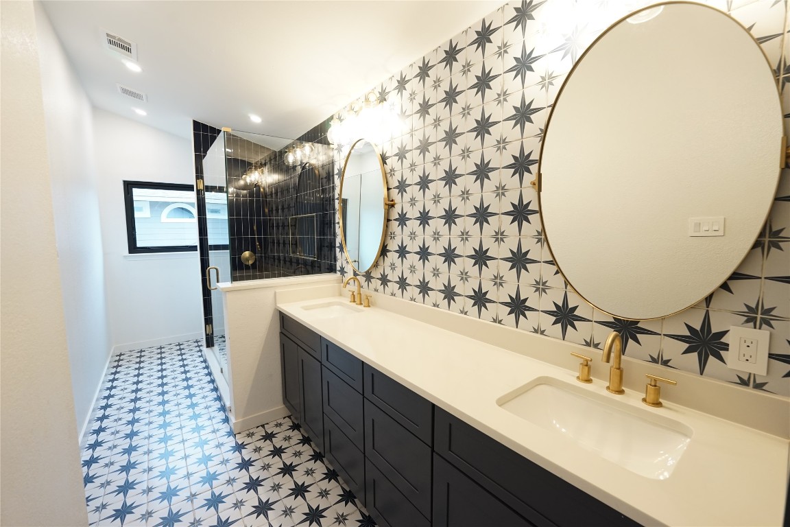 8006 Tiffany Drive Austin, TX 78749 - Photo 7 of 22 a bathroom with a sink and a mirror