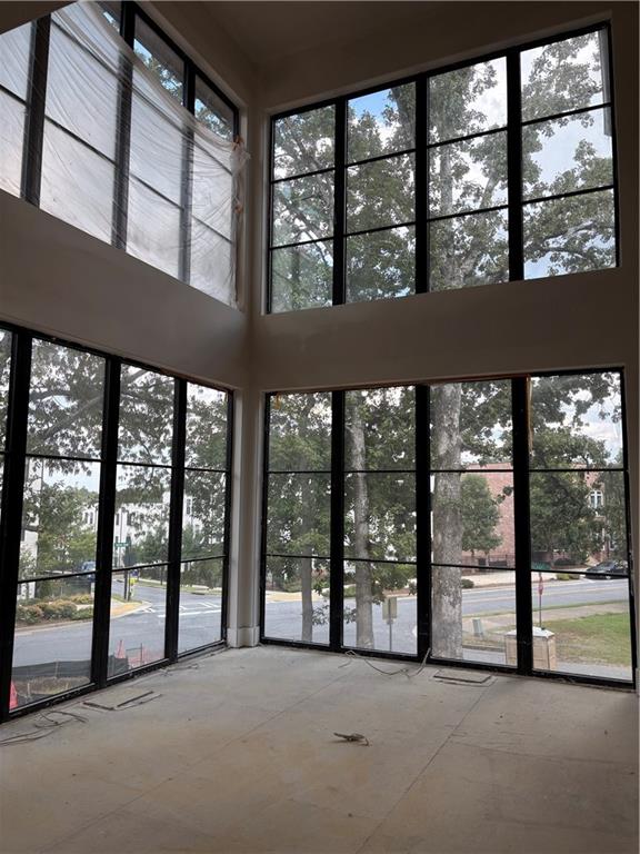 174 Devore Road Alpharetta, GA 30009 - Photo 3 of 10 a view of an empty room with a large window
