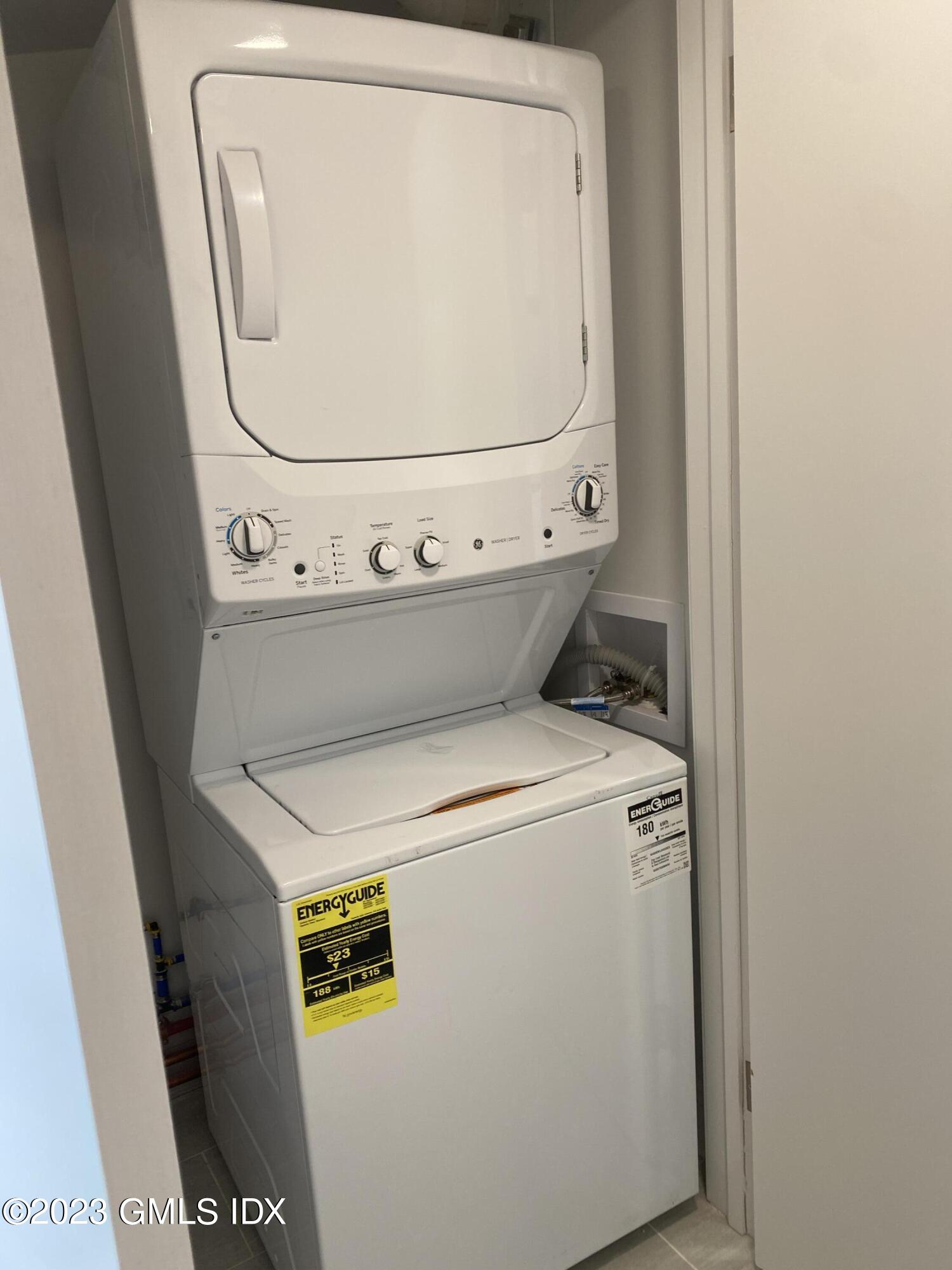 11 Old Field Point Road, Unit 2A Greenwich, CT 06830 - Photo 12 of 12 a utility room with dryer and washer
