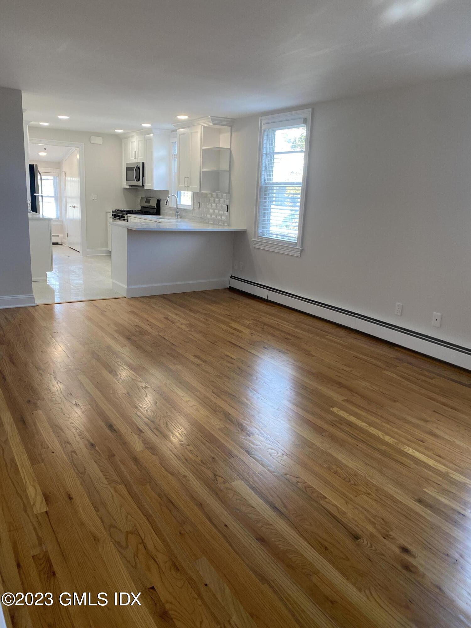 11 Old Field Point Road, Unit 2A Greenwich, CT 06830 - Photo 8 of 12 a view of kitchen and windows