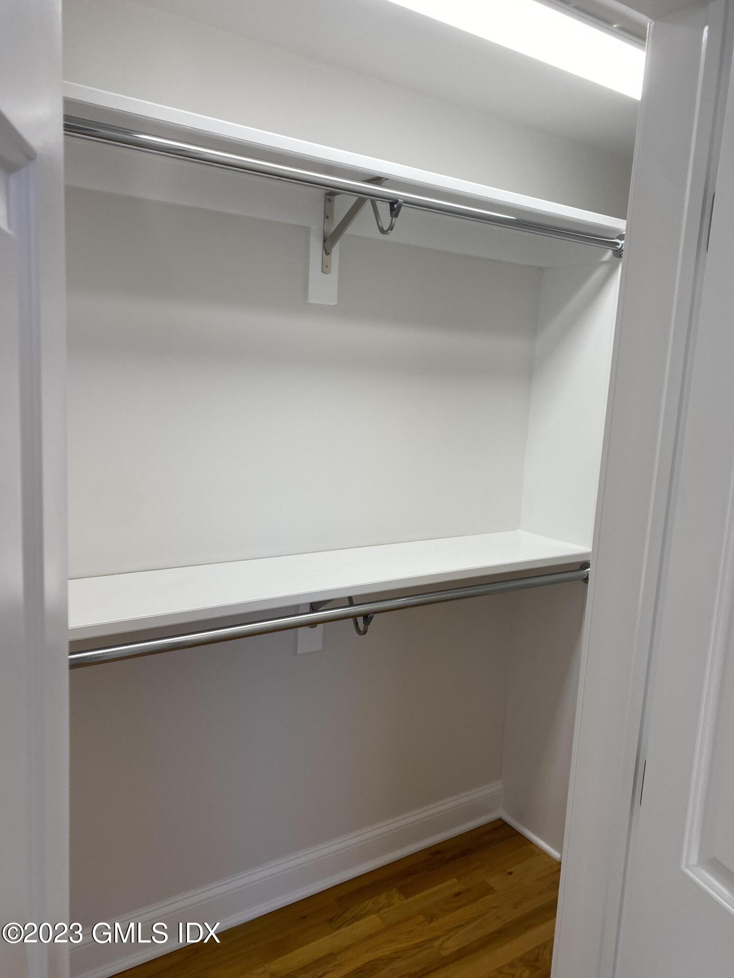 11 Old Field Point Road, Unit 2A Greenwich, CT 06830 - Photo 10 of 12 a view of a room with wooden floor