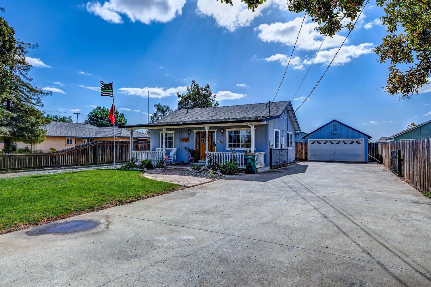 5712 East Jahant Road Galt, CA 95632 - Photo 41 of 42 Front of home with main garage.
