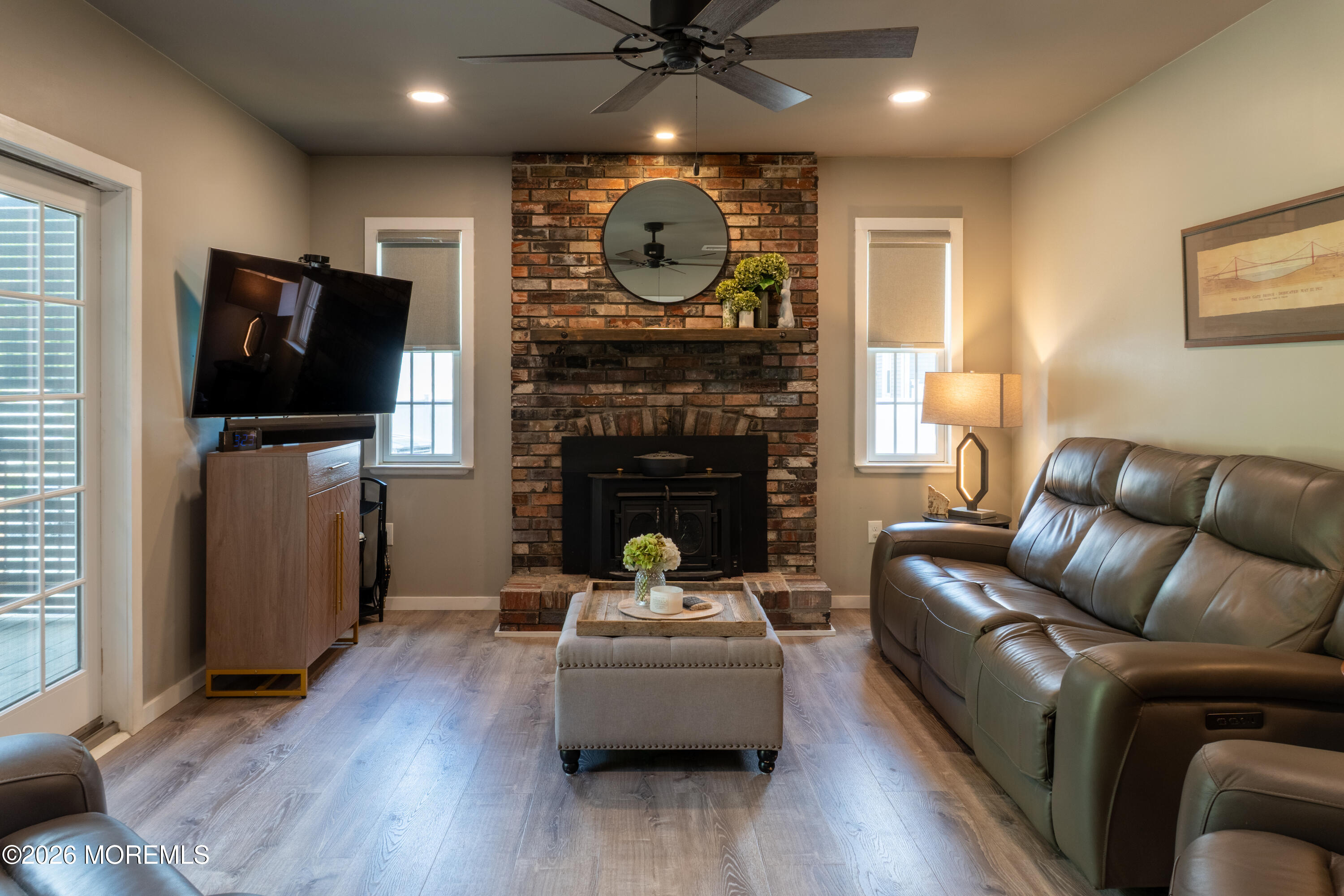 55 Toms River Road Jackson, NJ 08527 - Photo 13 of 31 a living room with furniture and a flat screen tv