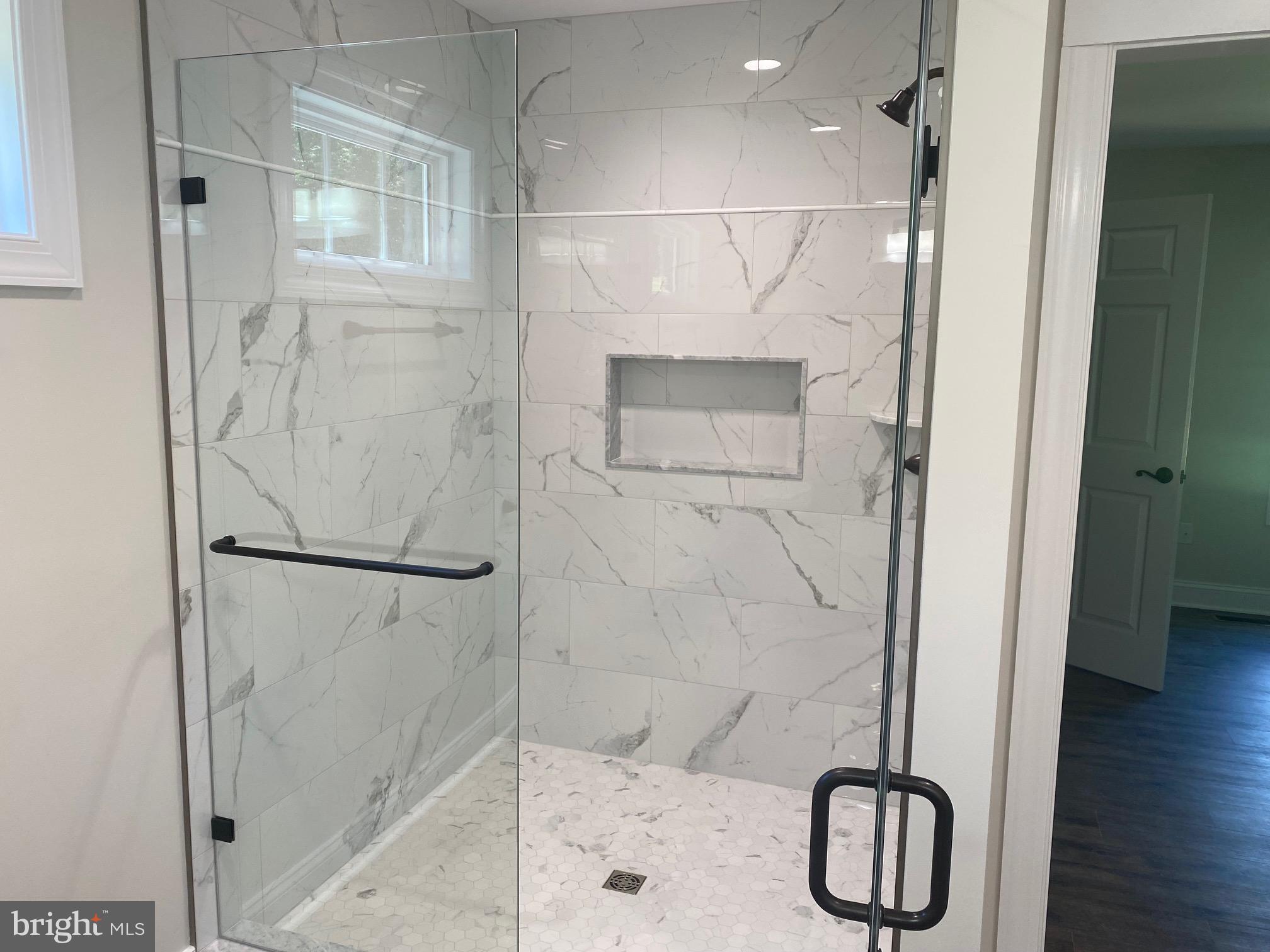 19078 South Merrimac Road Culpeper, VA 22701 - Photo 9 of 11 Primary bath tile shower & glass door