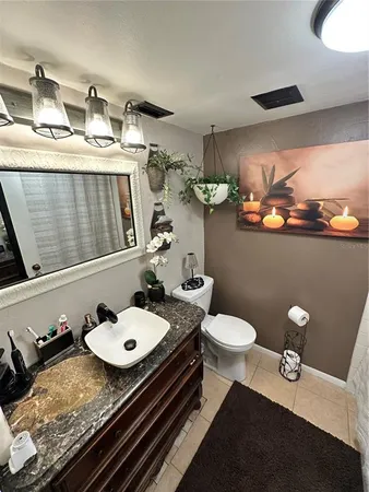 a bathroom with a sink and a toilet