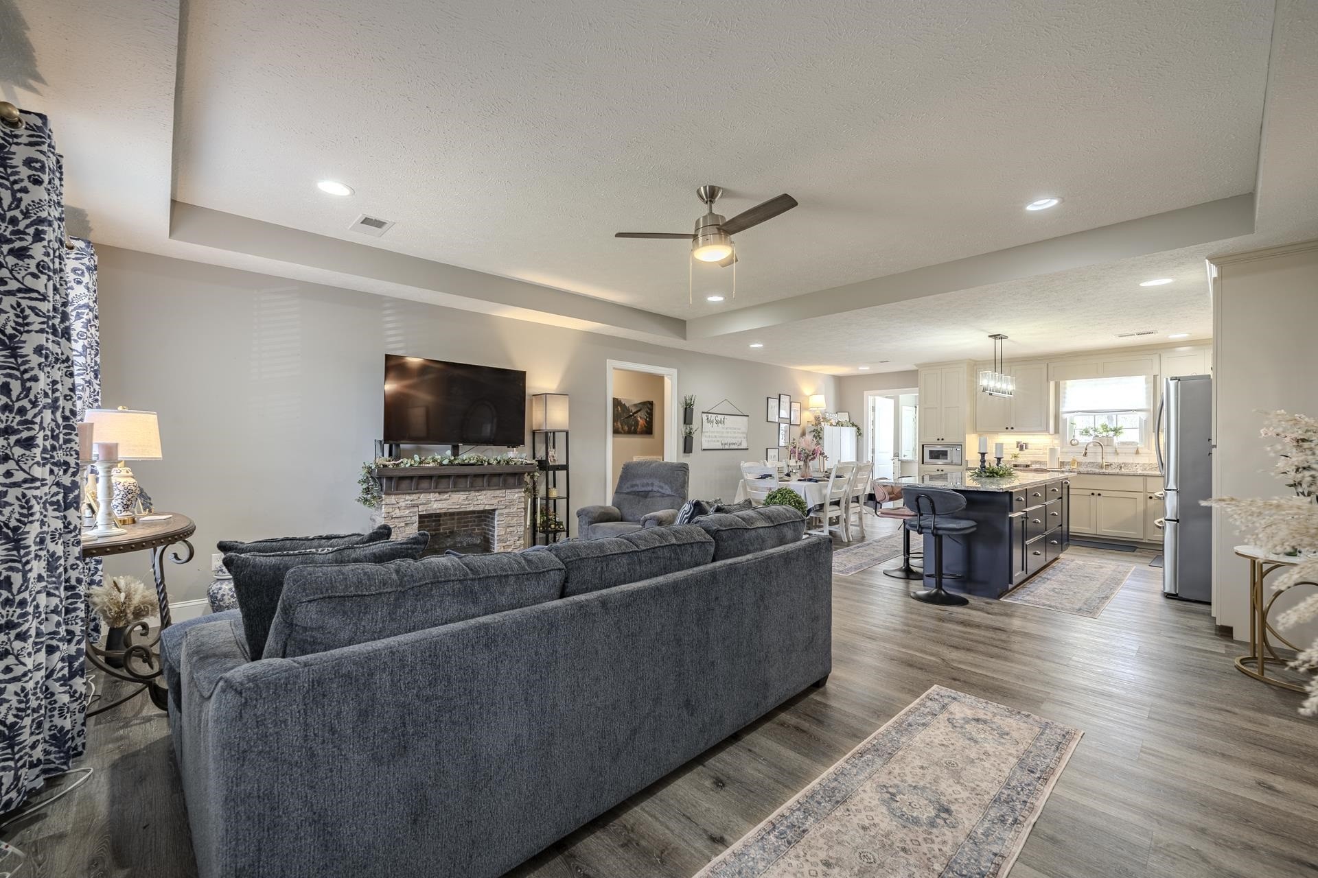 50 Perry Place Savannah, TN 38372 - Photo 14 of 38 a living room with furniture and a flat screen tv