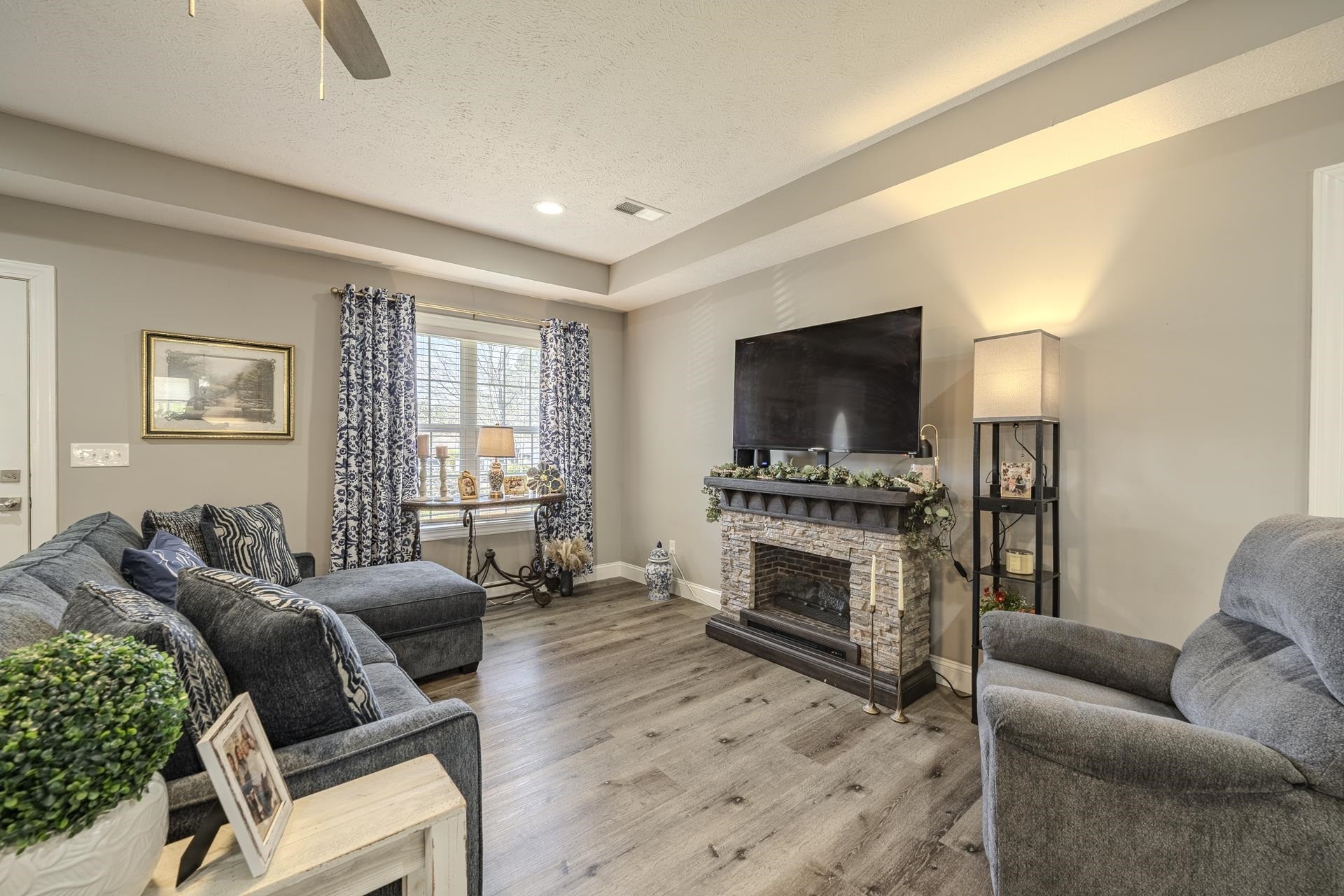 50 Perry Place Savannah, TN 38372 - Photo 15 of 38 a living room with furniture and a flat screen tv