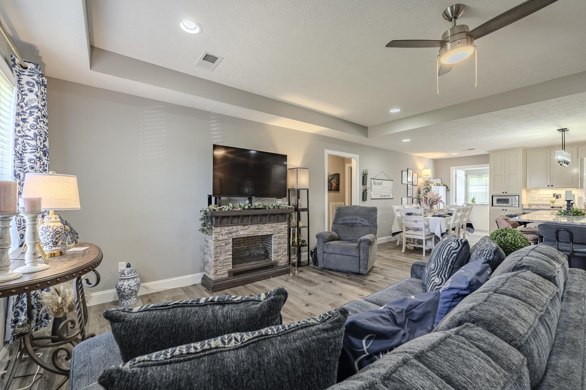 50 Perry Place Savannah, TN 38372 - Photo 16 of 38 a living room with furniture and a flat screen tv