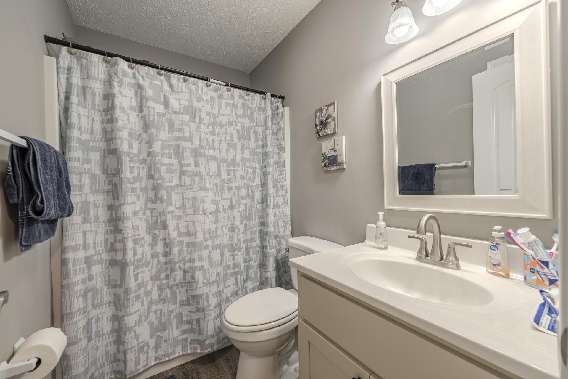50 Perry Place Savannah, TN 38372 - Photo 26 of 38 a bathroom with a sink and a mirror