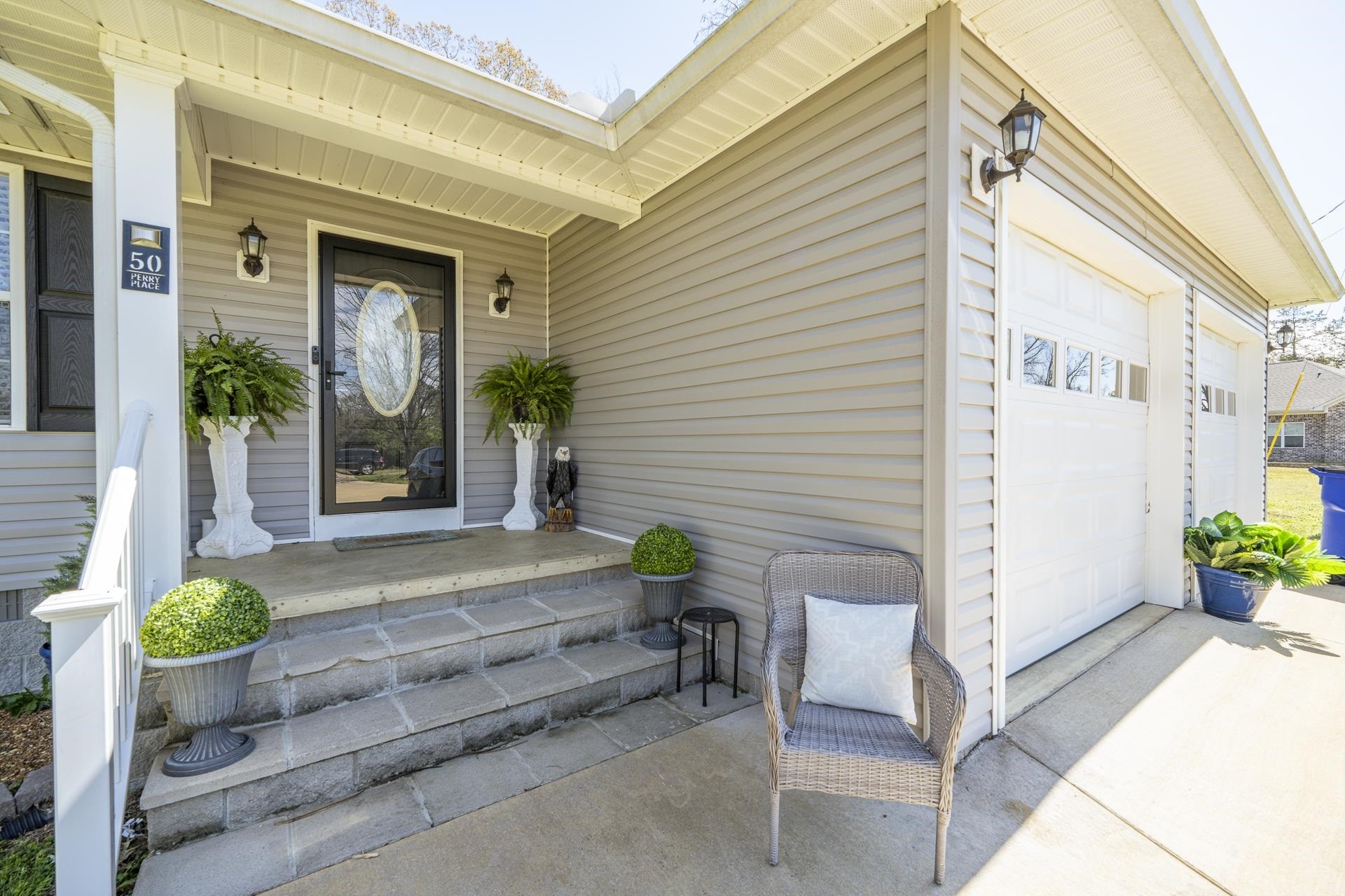 50 Perry Place Savannah, TN 38372 - Photo 30 of 38 a view of a bench in back yard of the house