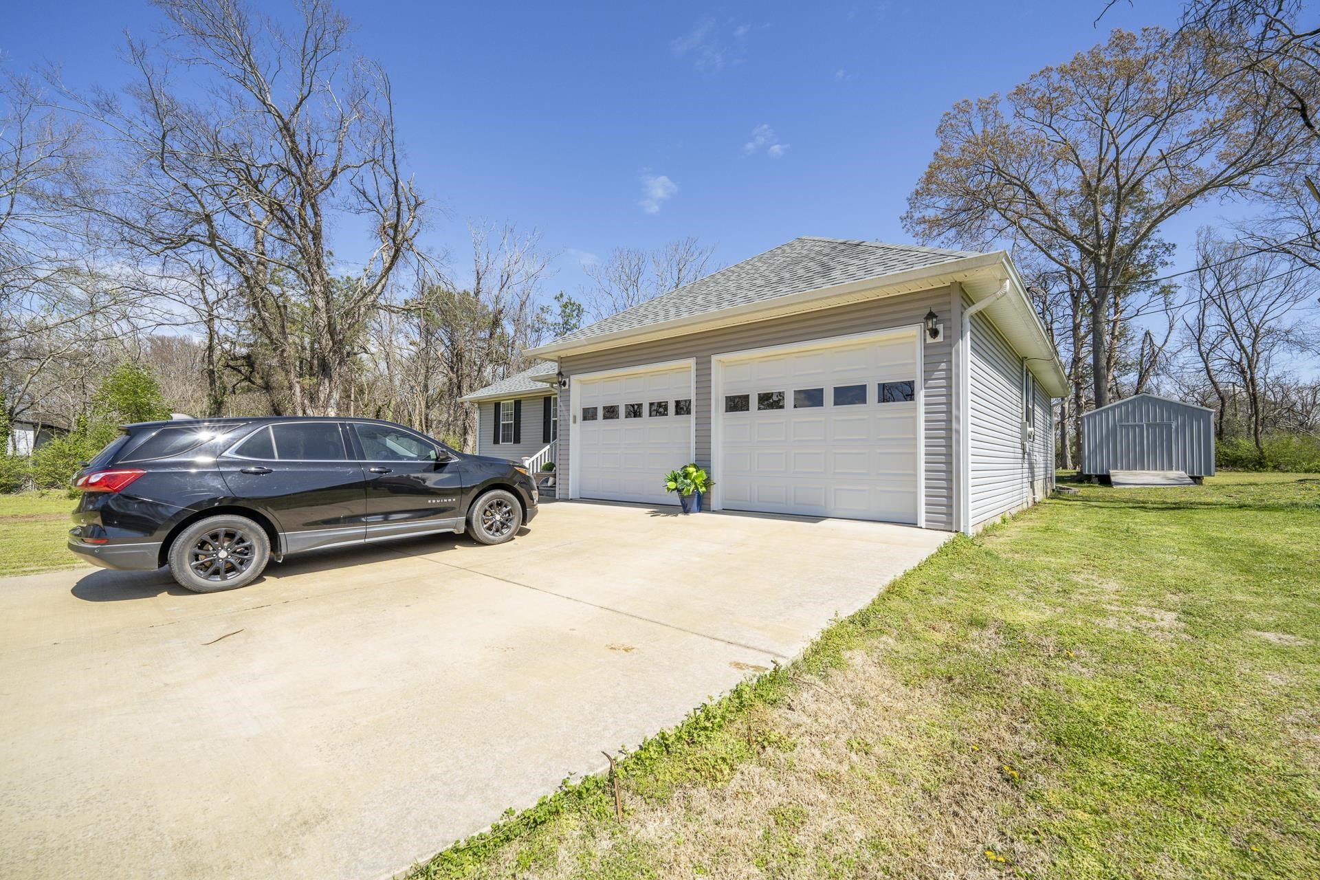 50 Perry Place Savannah, TN 38372 - Photo 37 of 38 a view of a car parked in front of a house