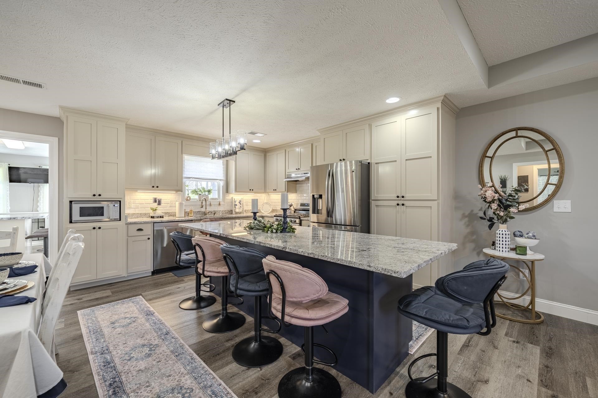 50 Perry Place Savannah, TN 38372 - Photo 4 of 38 a large kitchen with a table and chairs in it