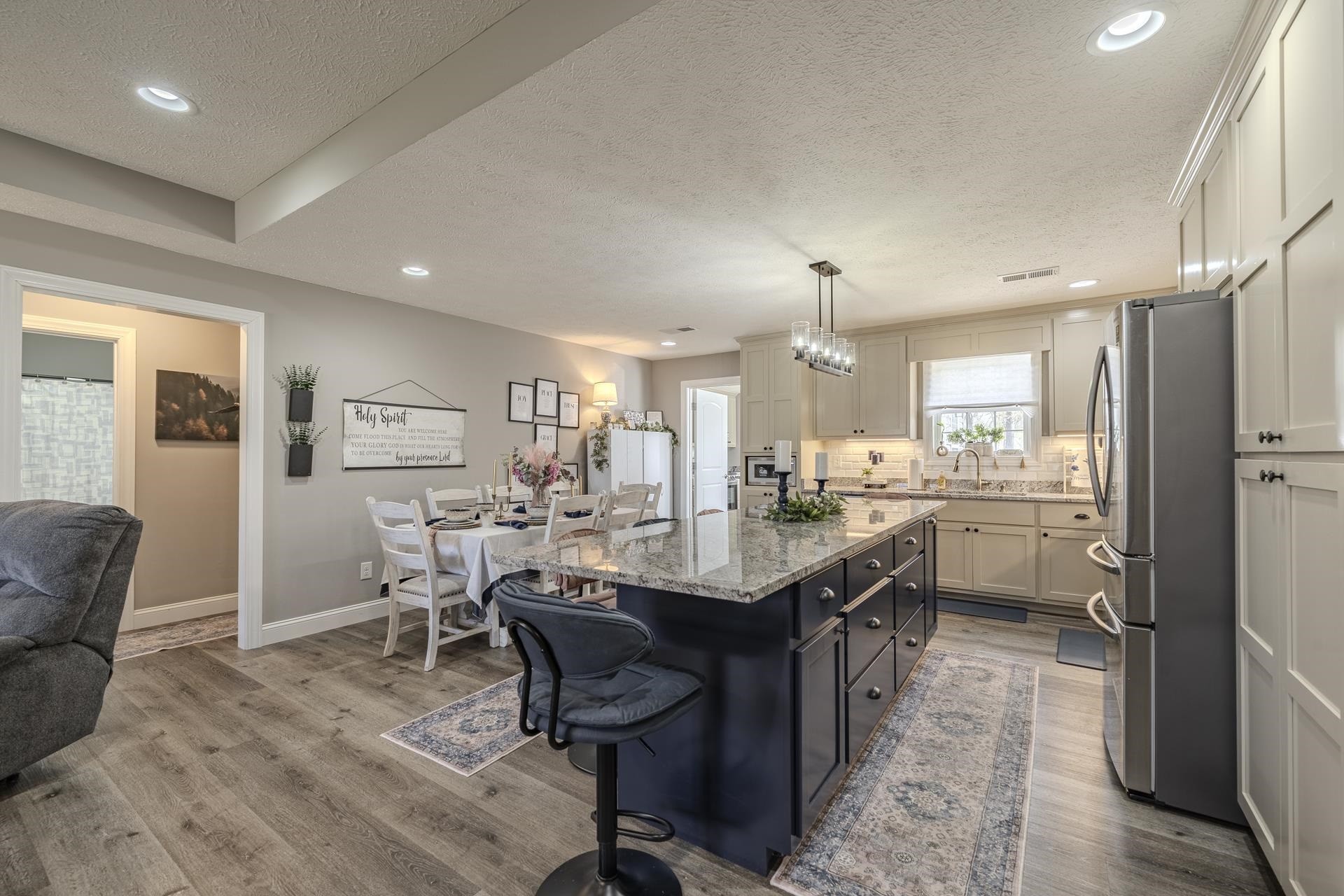 50 Perry Place Savannah, TN 38372 - Photo 7 of 38 a kitchen with counter top space a sink appliances and cabinets