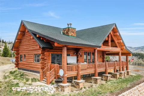 a view of a house with a balcony and porch