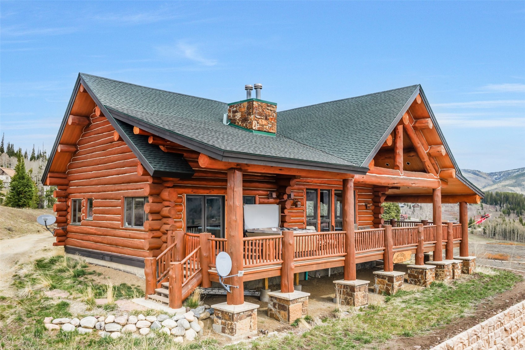 26755 Little Hawk Lane Clark, CO 80428 - Photo 12 of 47 a view of a house with a balcony and porch