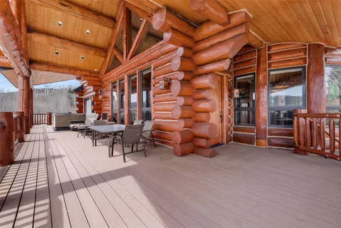 a view of balcony with furniture