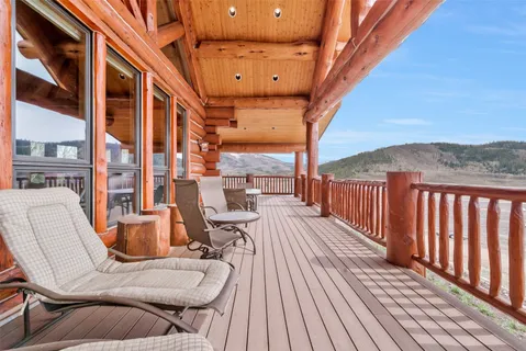 a view of balcony with furniture