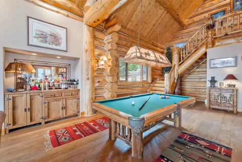 a room with table and chairs