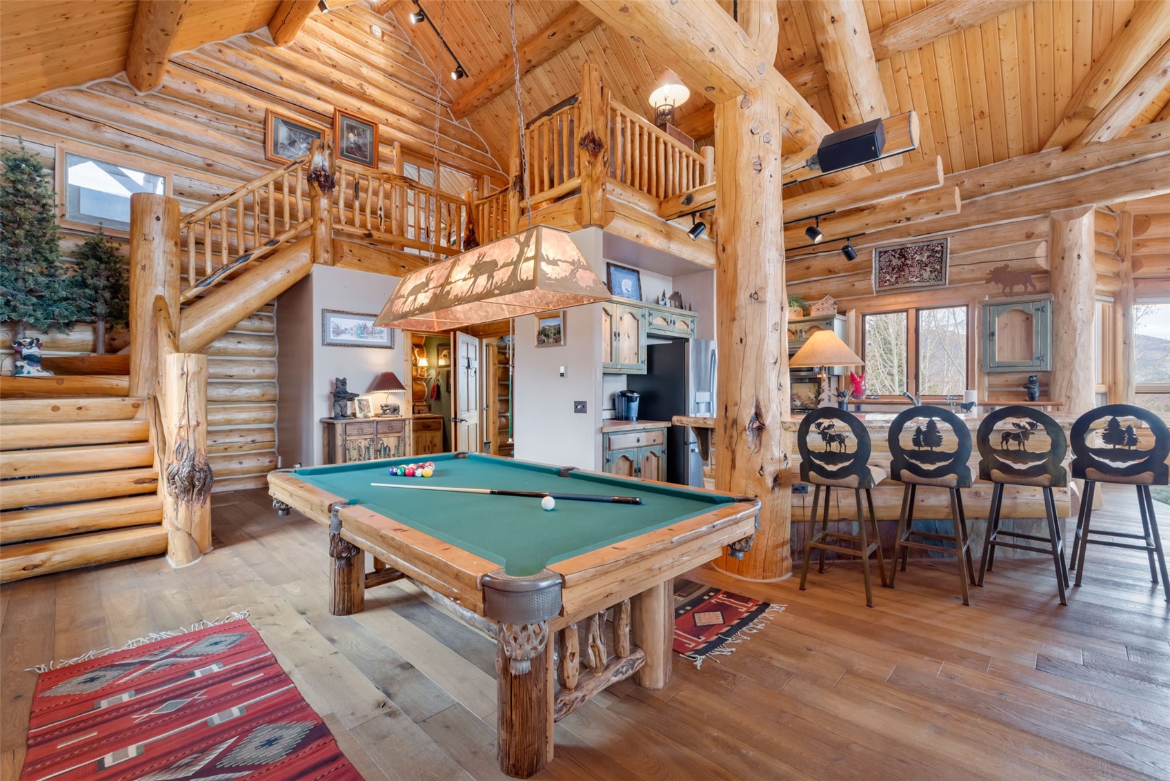 26755 Little Hawk Lane Clark, CO 80428 - Photo 26 of 47 a room with table and chairs