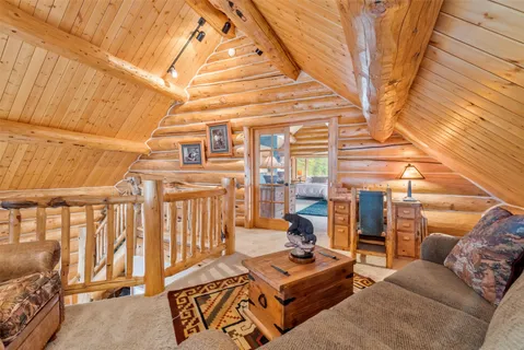 a bed room with a bed and a night stand