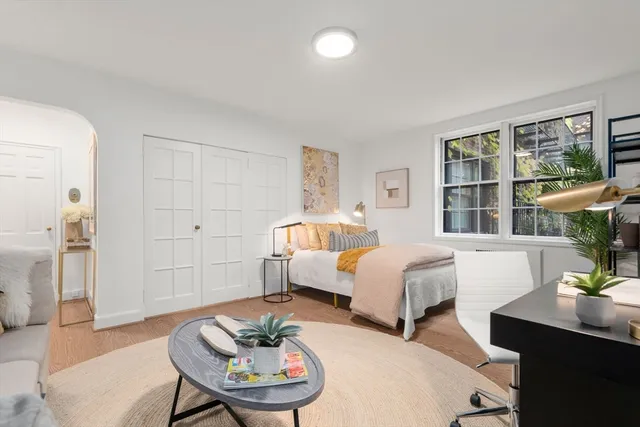 a room with a bed and a table