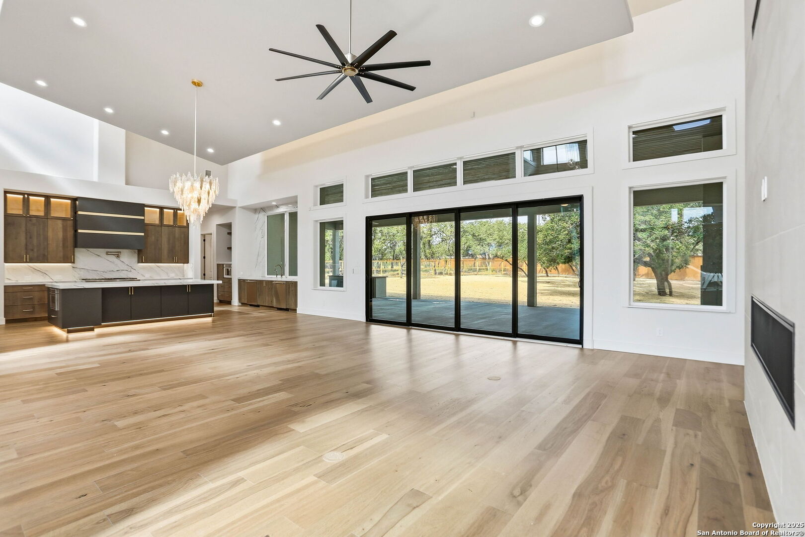 15 Wellesley Loop Shavano Park, TX 78231 - Photo 12 of 48 a view of livingroom with hardwood floor and a ceiling fan