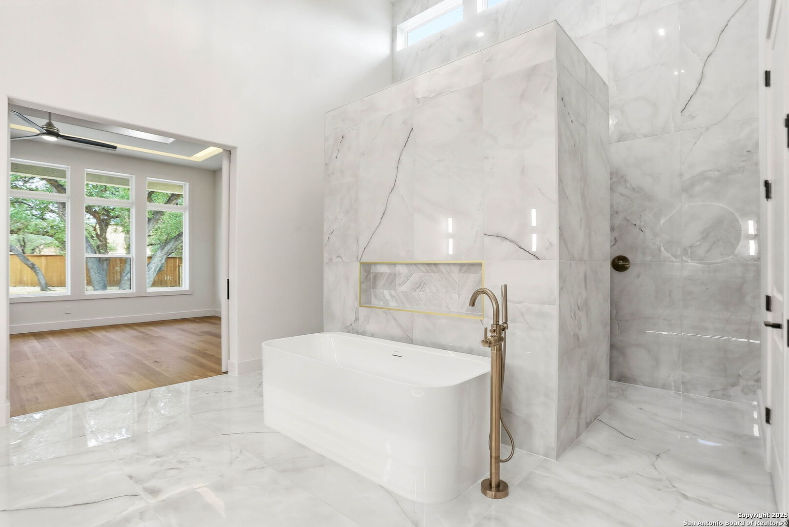 15 Wellesley Loop Shavano Park, TX 78231 - Photo 34 of 48 a bathroom with a tub shower and sink