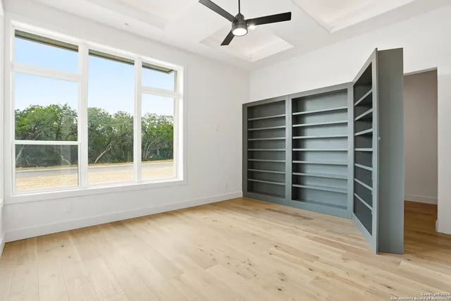a view of kitchen and wooden floor