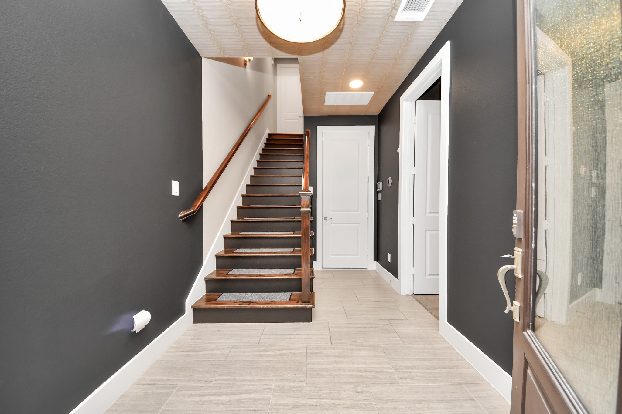 2704 Freund Street Houston, TX 77003 - Photo 4 of 45 a view of entryway and hall with wooden floor