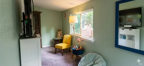 a view of a livingroom with furniture