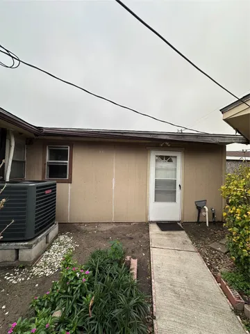 a backyard view of a house