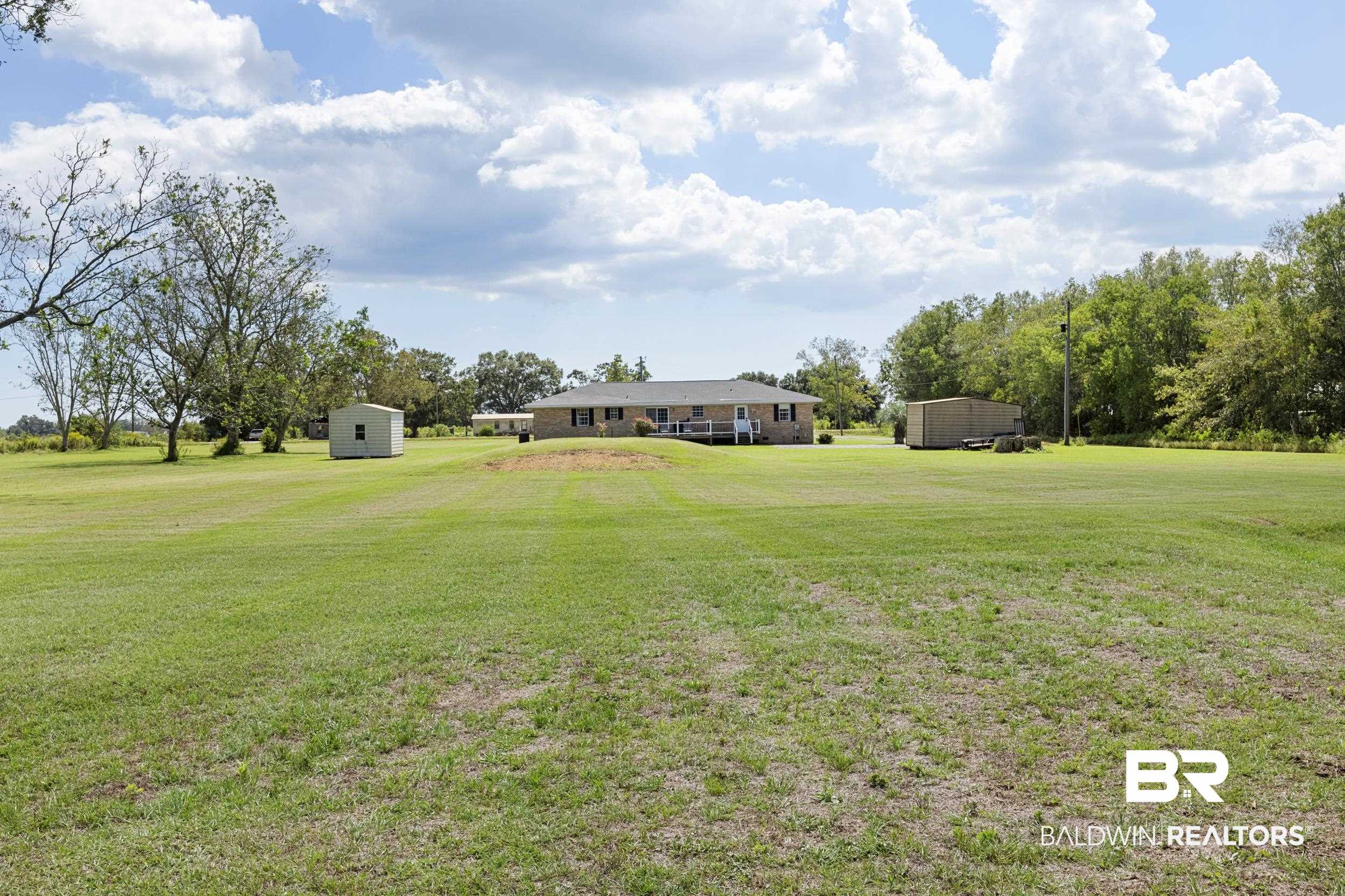 17689 Brewer Road Foley, AL 36535 - Photo 49 of 54 View of yard with a storage unit