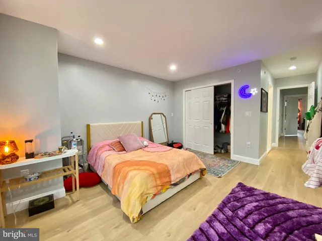 a bed room with a bed and a couch