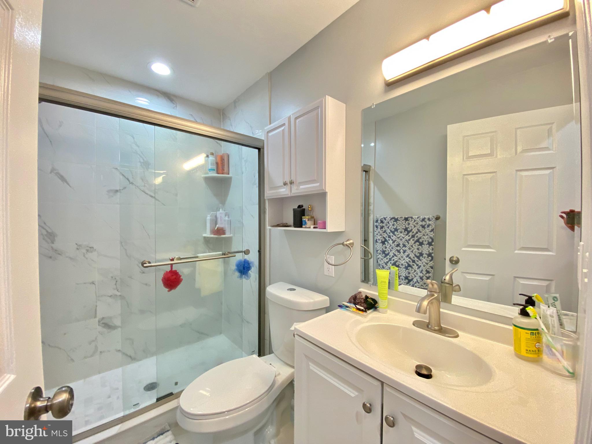 1932 North 8th Street, Unit 2 Philadelphia, PA 19122 - Photo 24 of 34 a bathroom with a sink toilet tub and shower