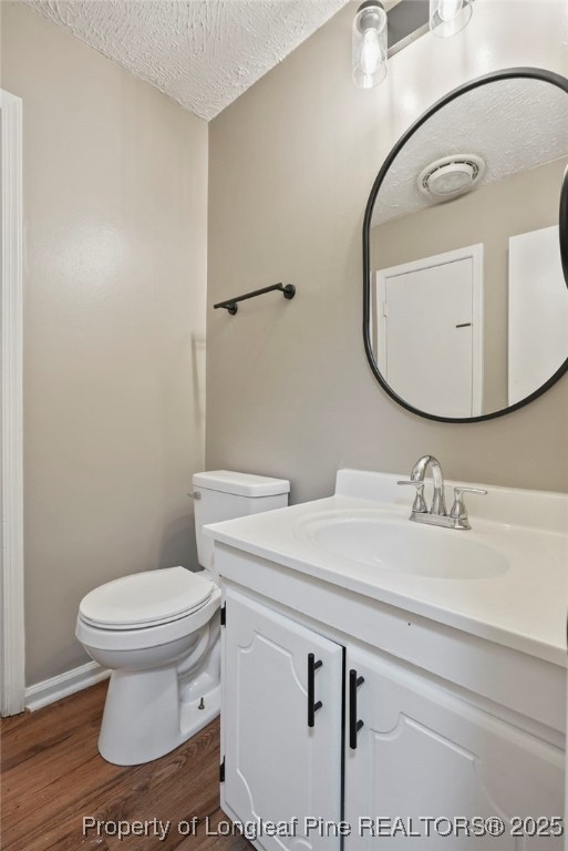 2308 Keith Drive Raleigh, NC 27610 - Photo 11 of 26 a bathroom with a sink and a mirror