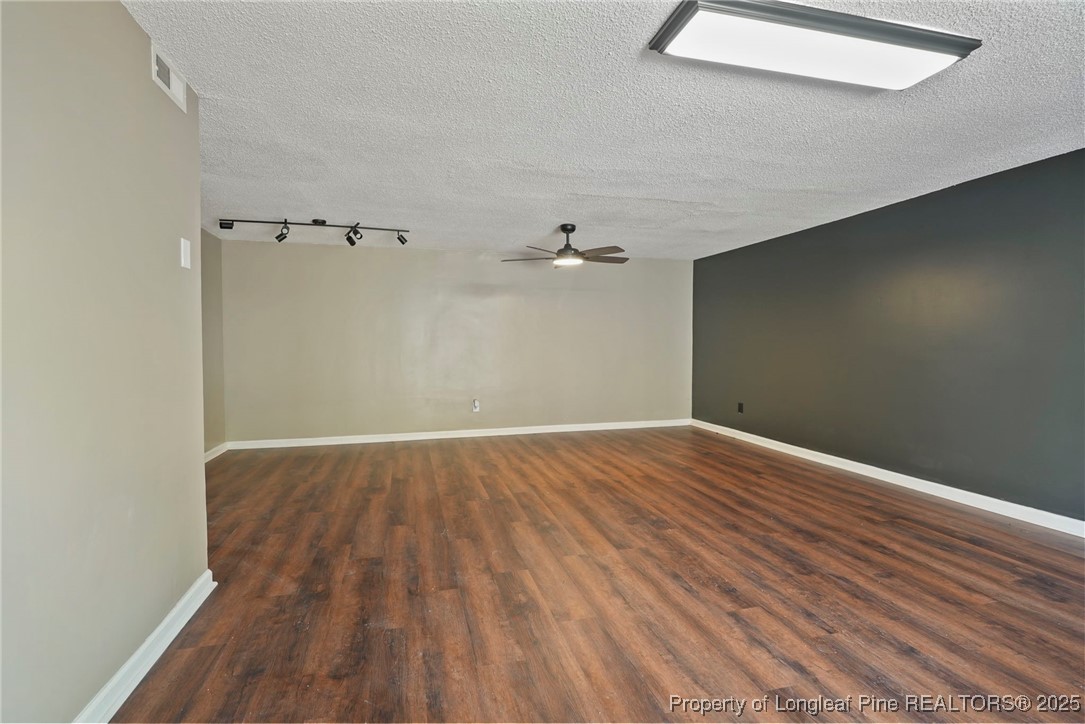 2308 Keith Drive Raleigh, NC 27610 - Photo 20 of 26 wooden floor in an empty room