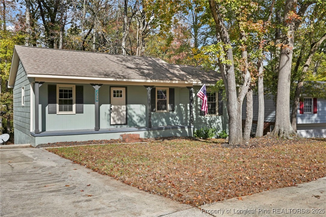 2308 Keith Drive Raleigh, NC 27610 - Photo 2 of 26 a front view of a house with garden