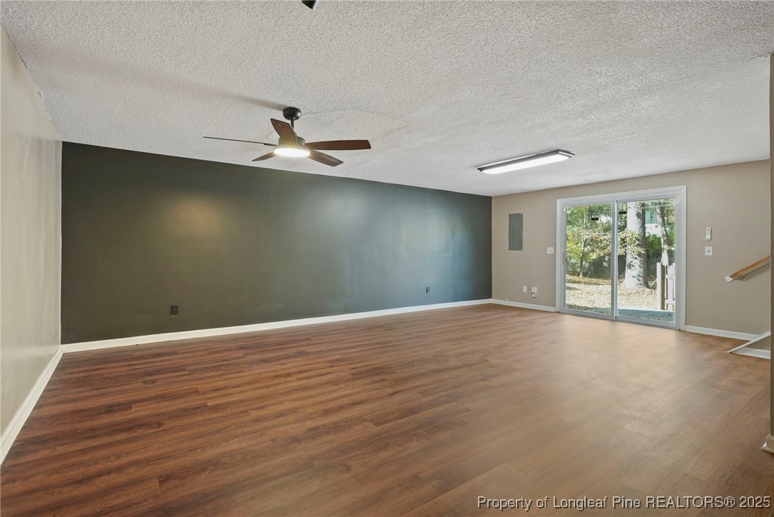 2308 Keith Drive Raleigh, NC 27610 - Photo 21 of 26 wooden floor in an empty room with a window
