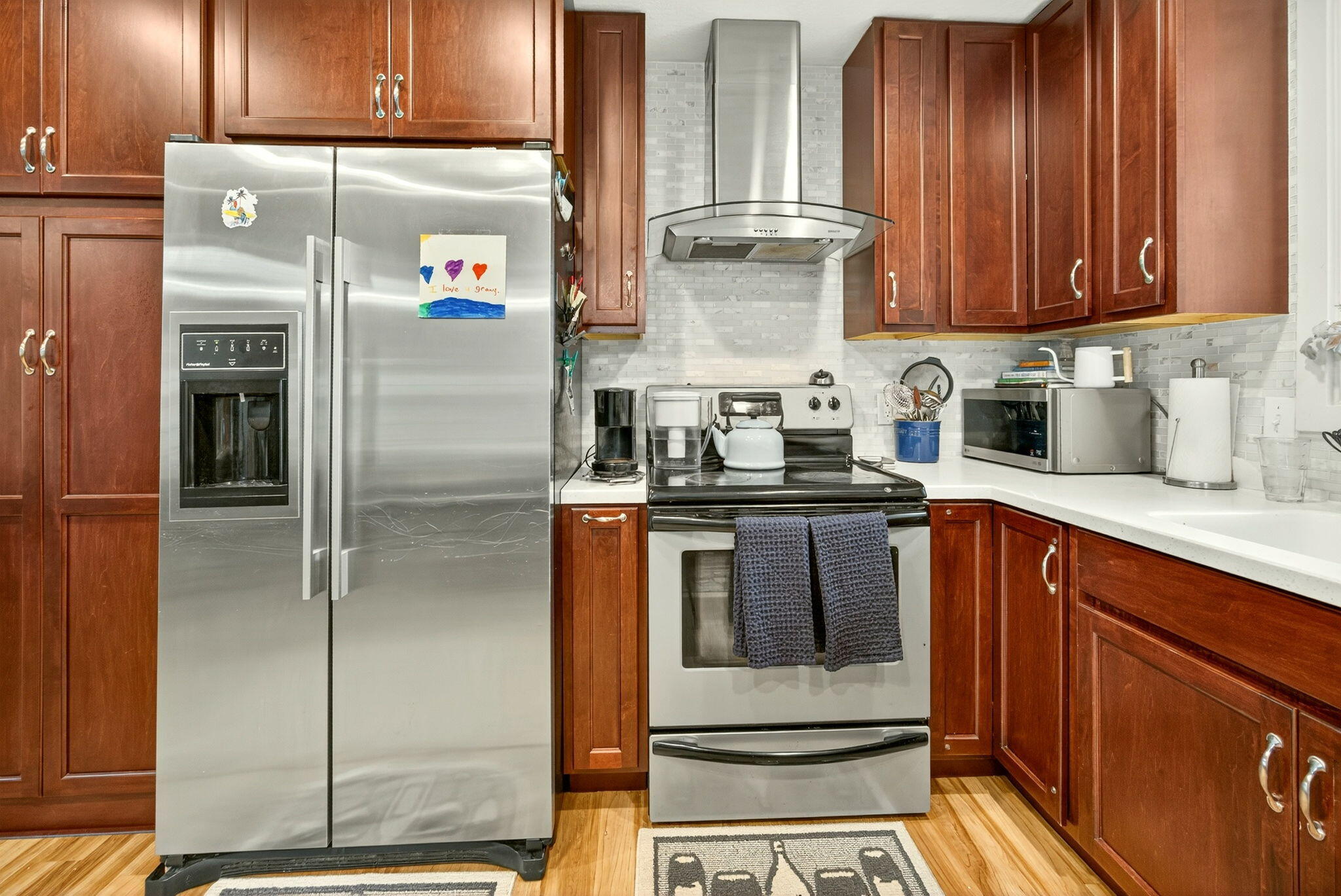 659 Herman Avenue Medford, OR 97501 - Photo 25 of 42 a kitchen with a refrigerator sink and cabinets