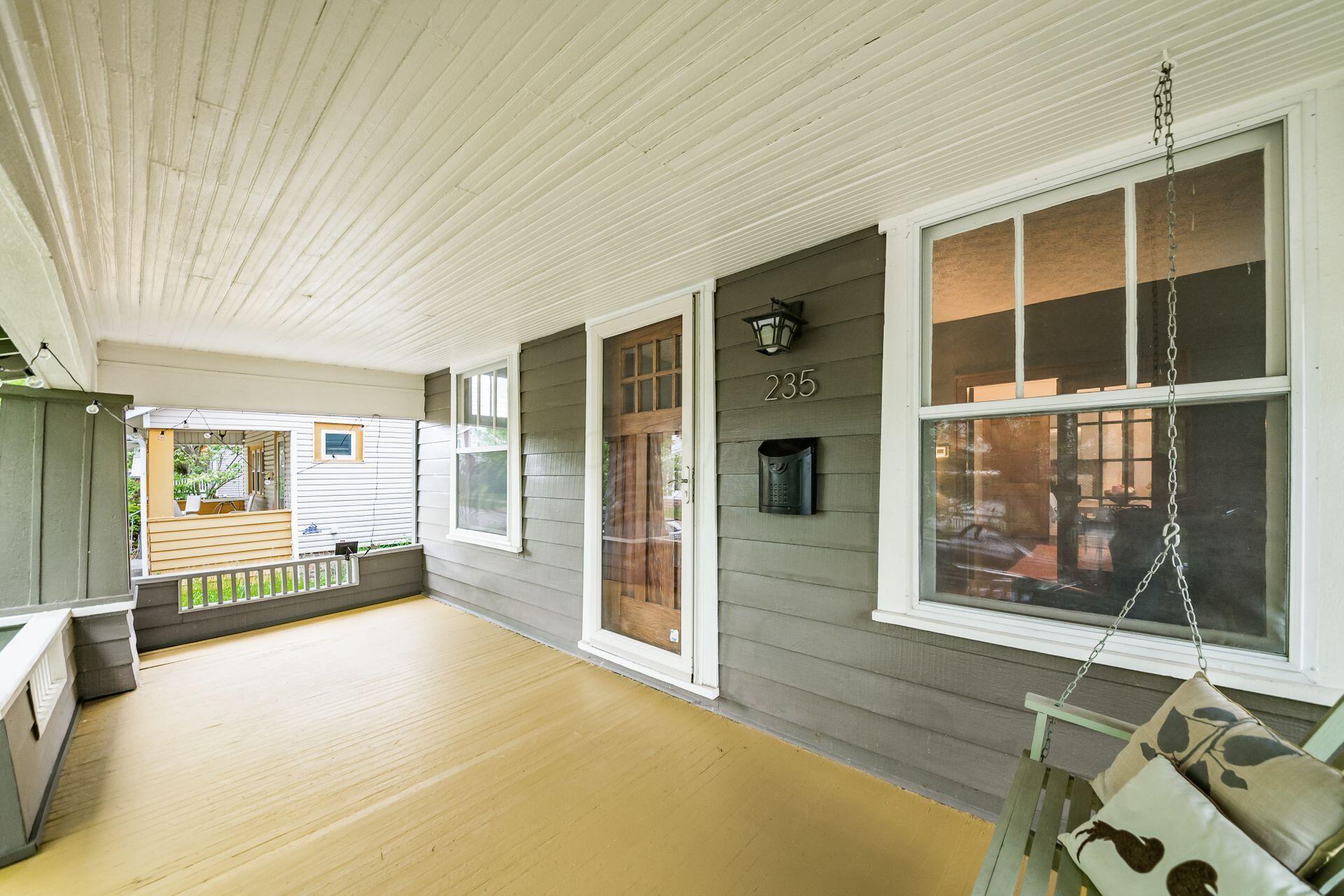 235 East Kelso Road Columbus, OH 43202 - Photo 4 of 50 Large front porch with porch swing