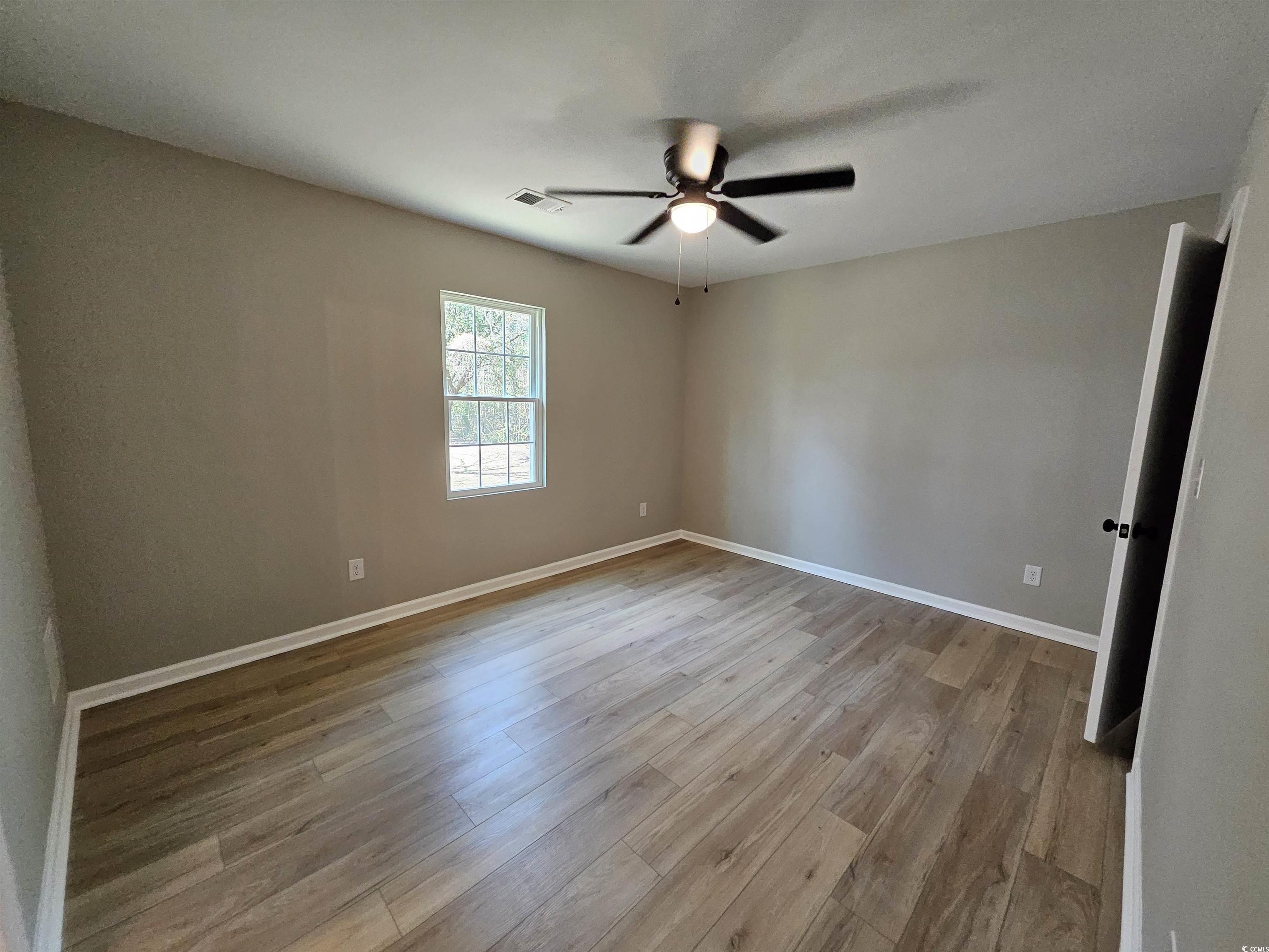 3115 Wayside Road Conway, SC 29527 - Photo 13 of 24 LVP flooring and freshly painted