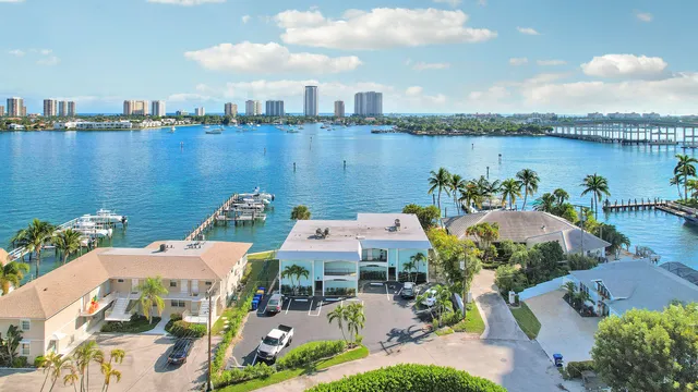 a picture of city view with lake view and boat