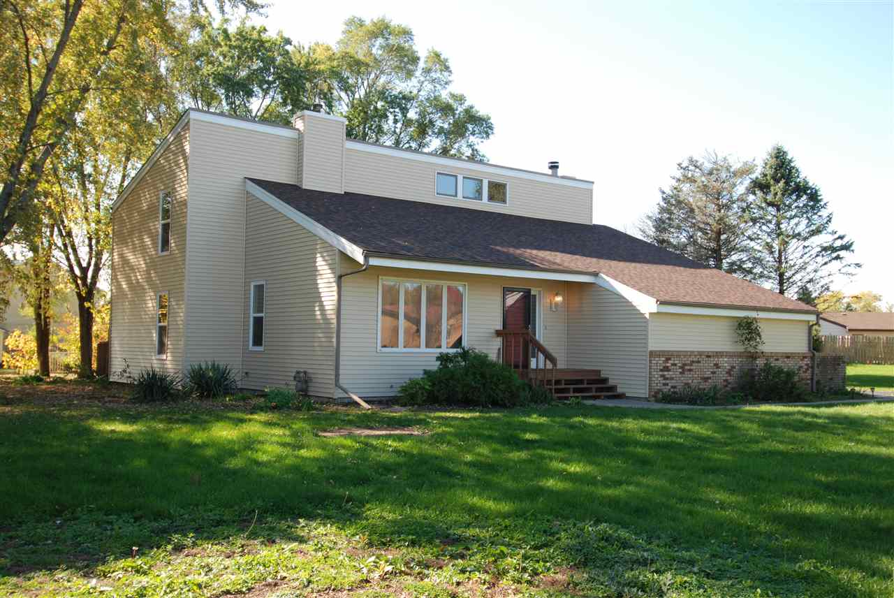 4091 Montclair Road Roscoe, IL 61073 - Photo 1 of 12 a front view of house with yard and green space