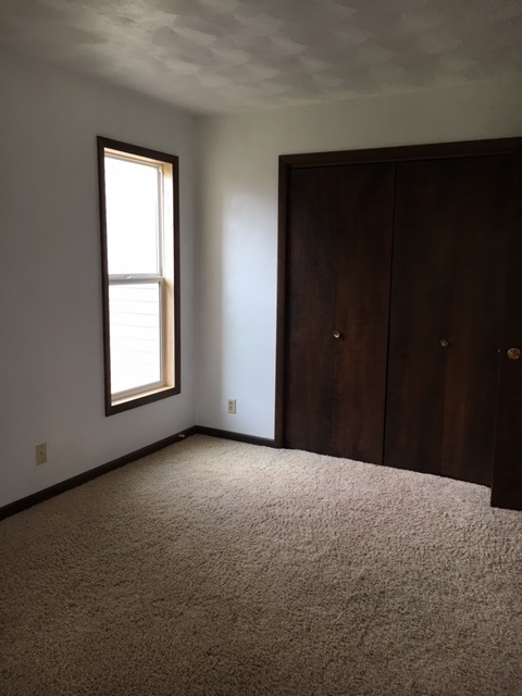 4091 Montclair Road Roscoe, IL 61073 - Photo 10 of 12 a view of empty room with windows