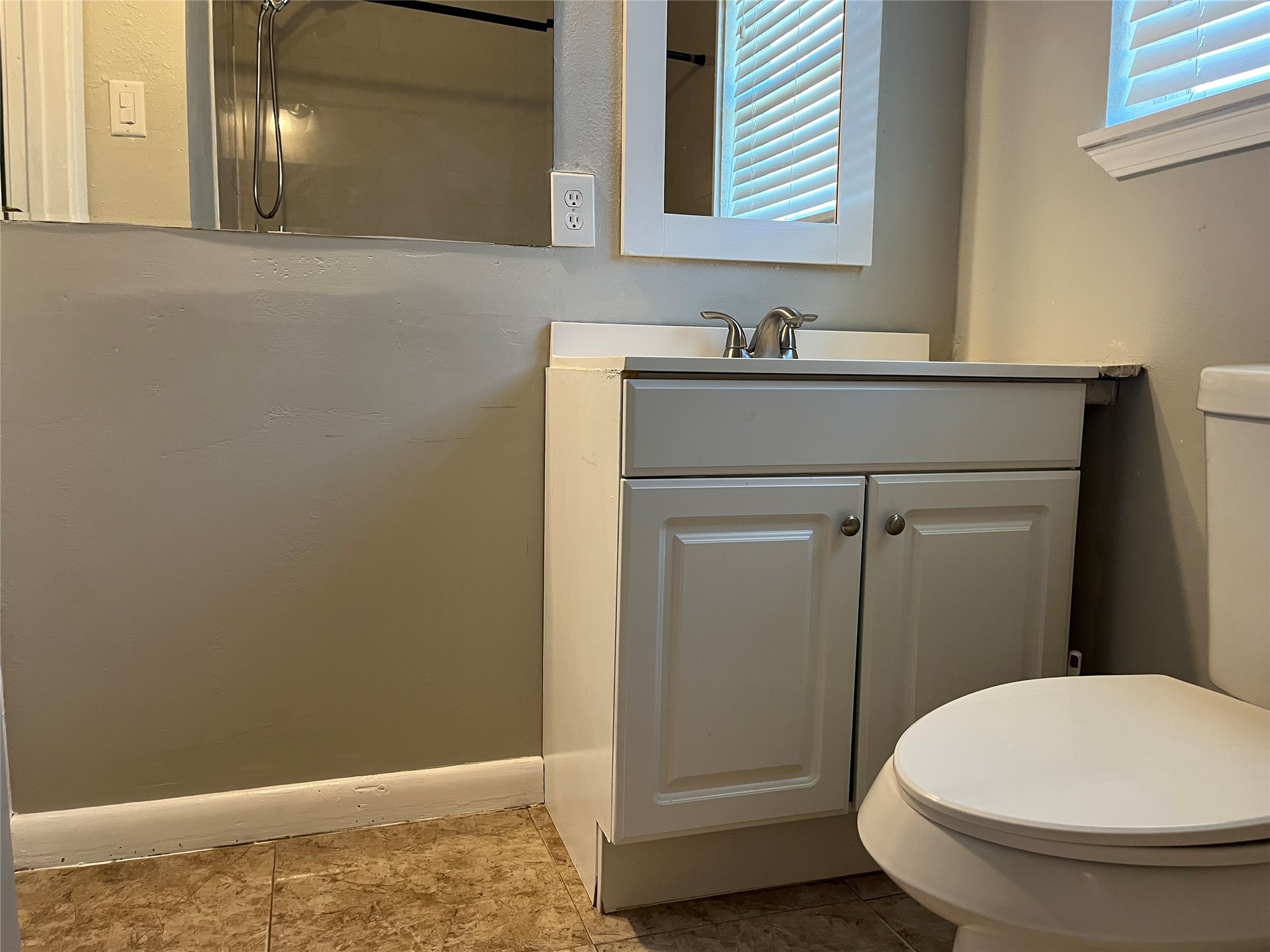 13125 Joliet Street Houston, TX 77015 - Photo 12 of 39 a bathroom with a sink and a toilet